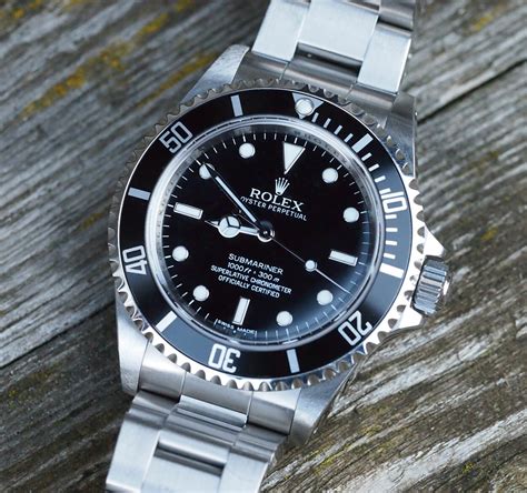 rolex submariner 14060m 2 liner review|Rolex Submariner 14060 review.